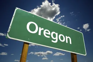 Dramatic Clouds Sky Drucke: Oregon road sign with dramatic clouds and sky