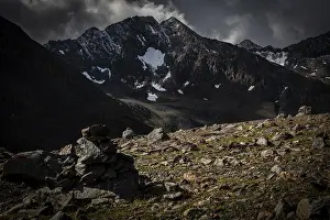 Atmospheric Mountain Scenery Drucke: Otztal mountains with dramatic sky