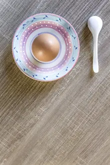 Chicken Eggs Nutrition Drucke: Overview from the top of a boiled egg with a teaspoon