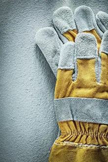Birds Eye View Drucke: Pair of protective gloves on a concrete background View from above