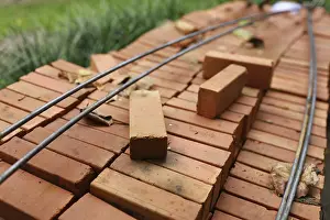 Red Brick Construction Material Drucke: Pallet a red brick building material stack of new red bricks for construction