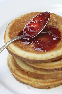 No People Eating Meals Drucke: Pancake with raspberry jam and spoon