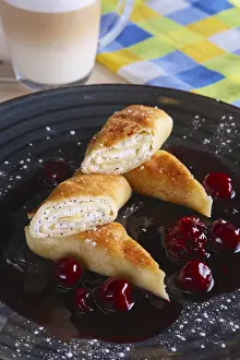 Thin Pancakes Drucke: Thin pancakes with curd and cherry jam
