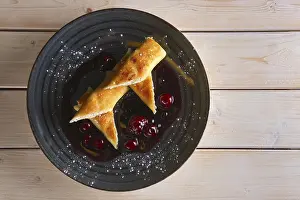 Thin Pancakes Drucke: Thin pancakes with curd and cherry jam