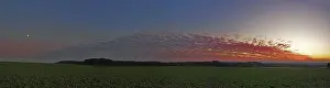 Evening Light Photography Drucke: Panorama of an arched cloud formation at sunset