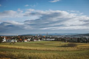 European Panoramic Photography Drucke: Panorama with city, fields and mountains under variable sky