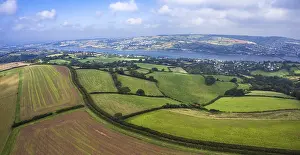 Unmanned Aircraft System UAS Drucke: Panorama from a drone of fields over Ringmore and River Teign