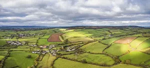 Panoramic View From Above Drucke: Panorama over Meadows and Fields over Devon in the colors of fall