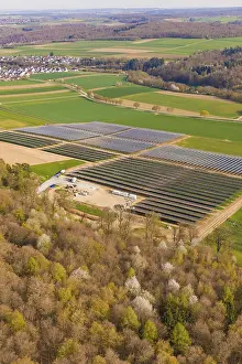 Solar Energy Alternative Power Generation Drucke: Panorama of solar fields surrounded by forests and fields