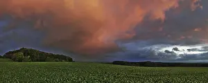 Deserted Evening Landscape Drucke: Panorama of storm clouds in the sunset