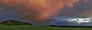 Cloudy Atmospheric Light Photography Drucke: Panorama of storm clouds in the sunset