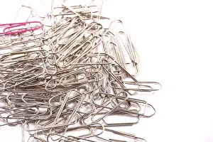 White Background Concept Drucke: Detail of paper clips on a white background