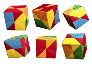 Child Development Through Art Drucke: Paper made multi colored patterned cubes folded origami style