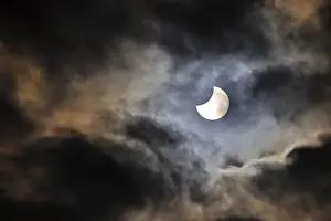 Bavarian Landscape Photography Drucke: Partial solar eclipse, thin cloud cover