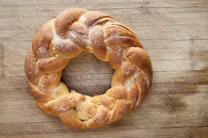 Empty Bakery Display Case Drucke: Pastry in the shape of a braid from dough