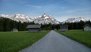 Tyrolean Landscape Drucke: Path and meadow with hay barns