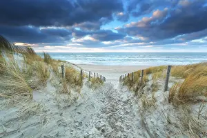 North Holland Beach Drucke: Path on sand to beach at sunset