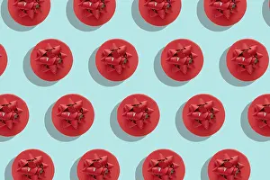 Top View Flat Lay Shot Drucke: Pattern red gift box with decorative bow on blue surface top view flat lay