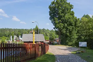 Urban Environment Eastern Europe Drucke: Paved path with trees and view of the lock
