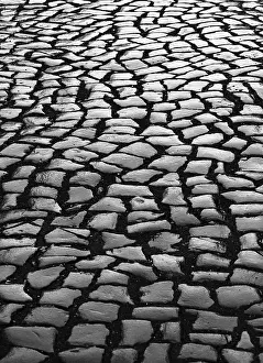 Backlit Cobblestones Drucke: Pavement, backlit cobblestones