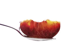 Fruit Nutrition Drucke: Peach slice on a spoon