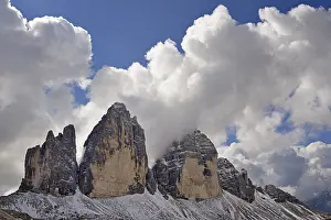 Blue Sky Italy Drucke: Three Peaks of Lavaredo North Wall with deep clouds