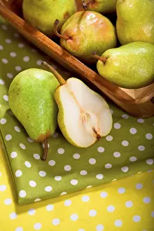 Fruit Still Life Images Drucke: Pears in a basket on a table
