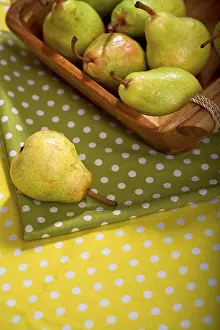 Fruit Still Life Images Drucke: Pears in a basket on a table