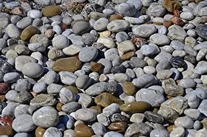 Pebbles On Beach Drucke: Pebbles on the beach, background image, Greece