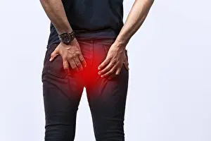 Diarrhea Symptoms Drucke: People with digestive problem touching his buttock