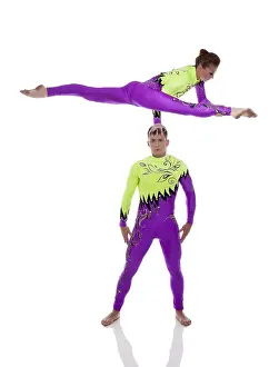 Recreational Activity Images Drucke: Performance of handsome flexible acrobats in studio