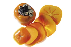 Freshly Sliced Fruits Drucke: Persimmon, whole and sliced