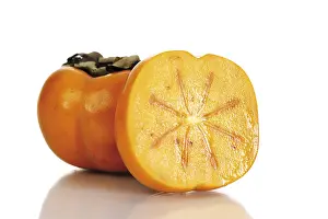 Studio Fruit Photography Drucke: Persimmons, whole and halved