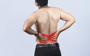 Back Problems Drucke: Person with back problems on isolated background