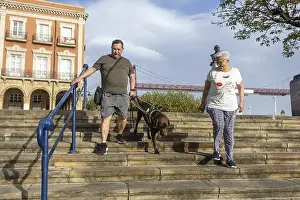 Friendship And Togetherness Drucke: Two persons, accompanied by a guide dog