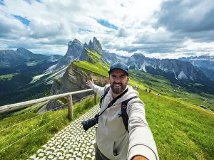 UNESCO World Heritage Site Alps Drucke: Photographer with backpack