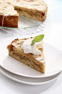 Baked Goods Studio Shot Drucke: Piece of apple cake with cream