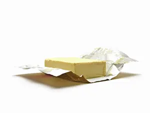 Dairy Product Packaging Drucke: A piece of butter