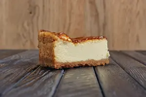 Close Up Cheesecake Drucke: Piece of cheesecake on table