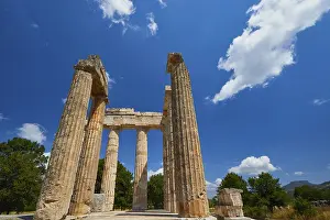Peloponnese Greece Tourism Drucke: Pillars of an ancient structure under a clear sky with few clouds