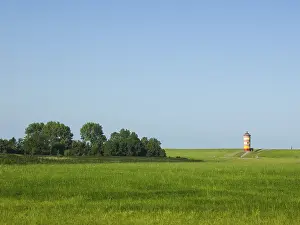 Northern Germany Deserted Landscape Drucke: Pilsum lighthouse in the background