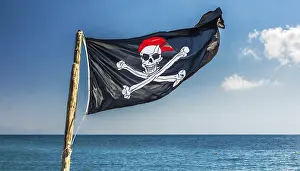 Deserted Island Scene Drucke: The pirate flag flutters in the wind
