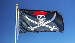 Isolated Flag Image Drucke: The pirate flag flutters in the wind