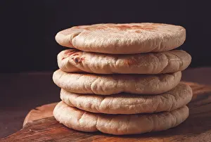 Bakery Products On Table Drucke: Pita bread, stack, on the table, no people
