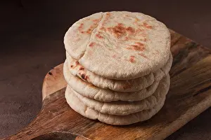 Arabic Cuisine Inspiration Drucke: Pita bread, stack, on the table, no people