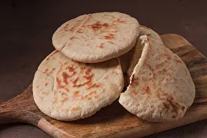 Bread Nutrition Facts Drucke: Pita bread, stack, on the table, no people