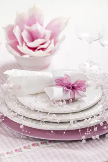 Uninhabited Dining Area Drucke: Place setting in pink tone with small present for the guests