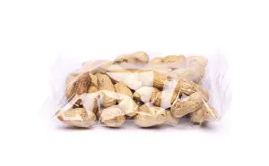 Plain White Background For Copy Space Drucke: Plastic bag of peanuts on the white background