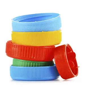 Ecofriendly Waste Separation Drucke: Plastic bottle caps isolated on white