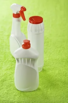 Green Background Drucke: Three plastic bottles on a green background